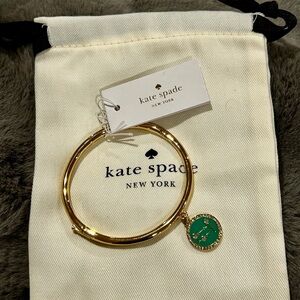 NWT Gemini  Kate Spade Gold Bangle with Green Charm